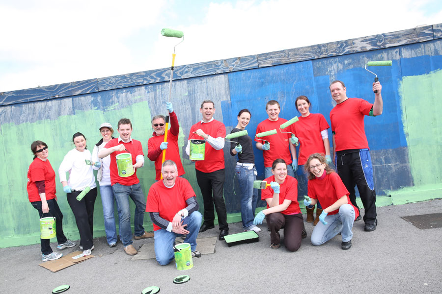 J0249800115 People from the Docklands Cleanup and paint the hoarding in Dublin’s Docklands