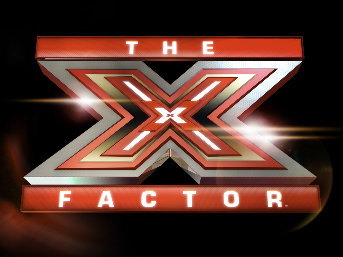 Red and silver The X Factor logo on a black background with lens flare effects.