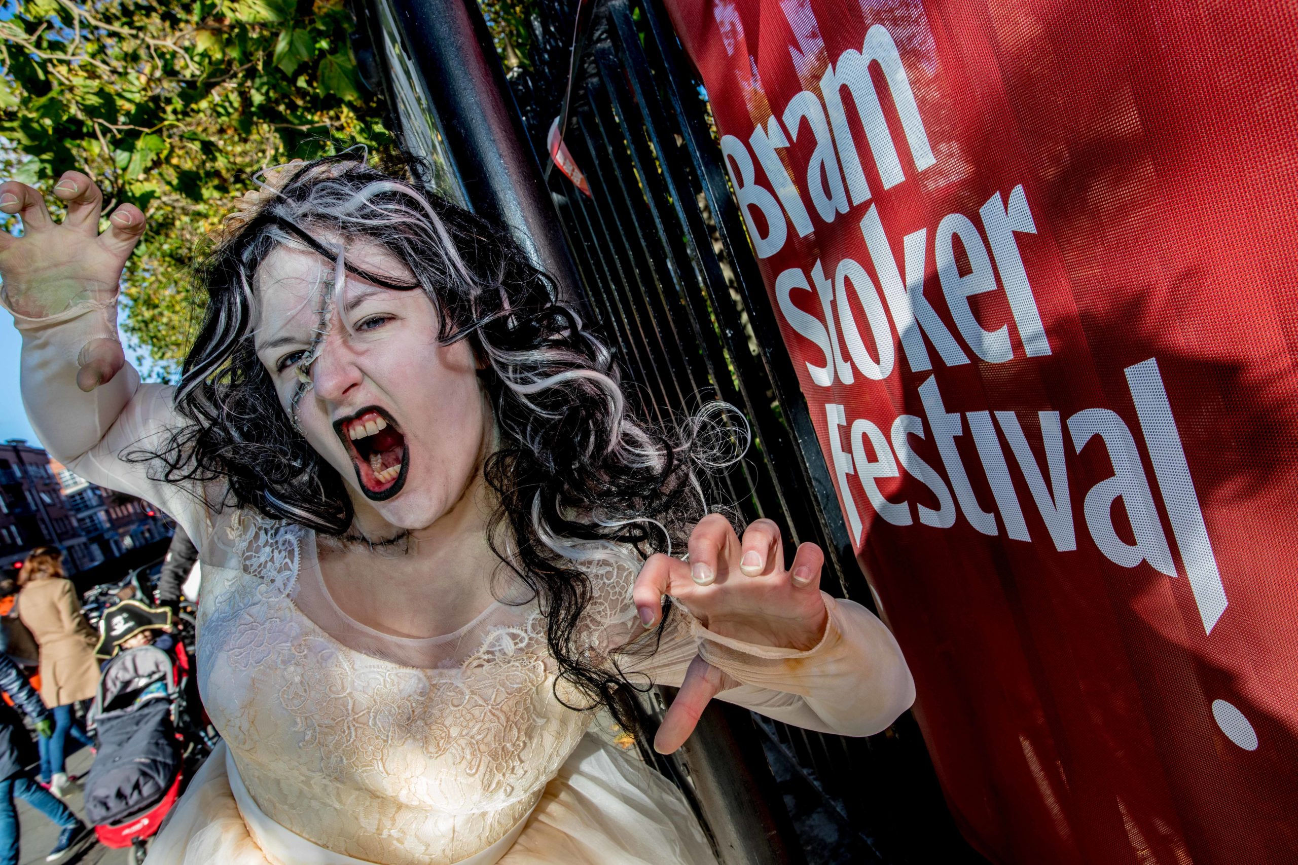 Vampire-themed performer at Bram Stoker Festival, Dublin, in costume with dramatic pose and expression.